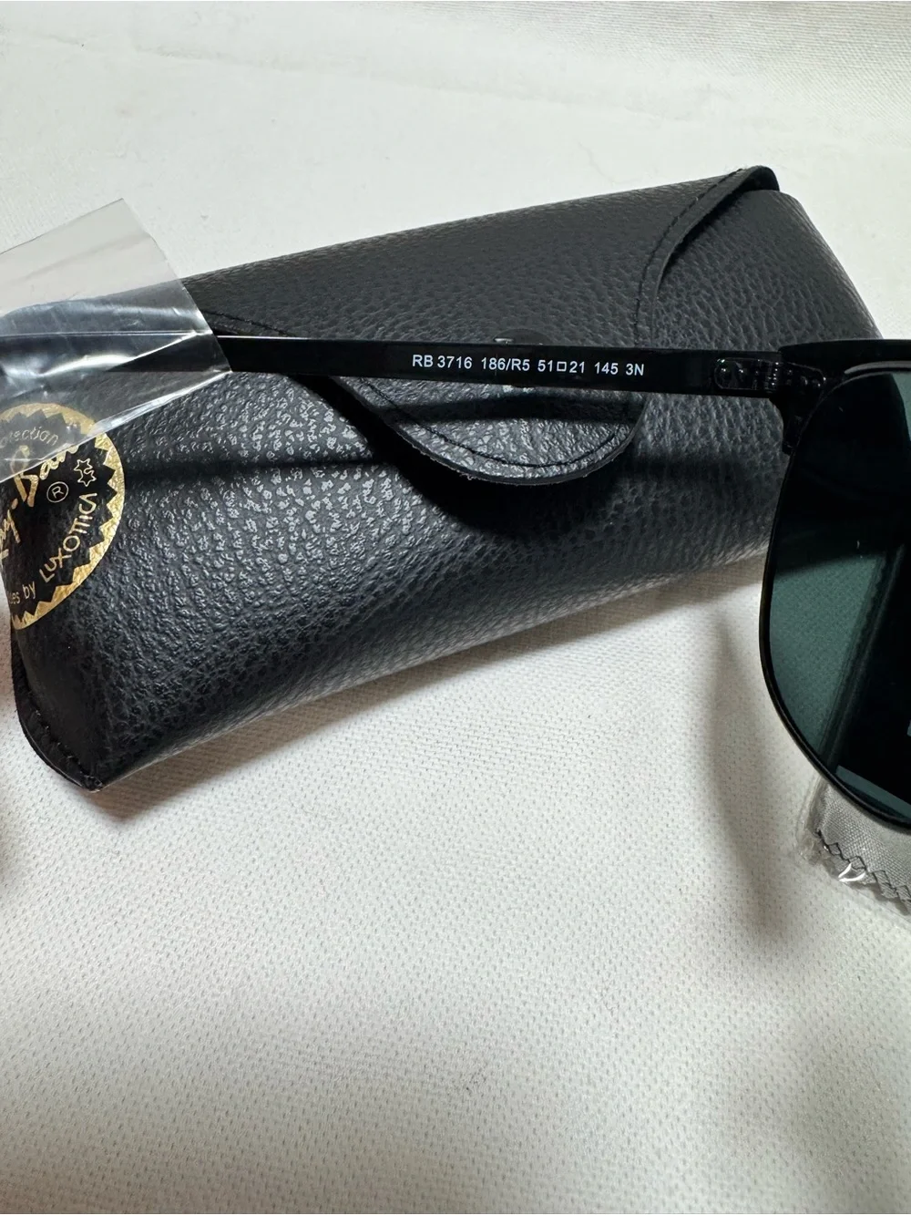 Ray-Ban Black Frame Sunglasses with Green Lenses